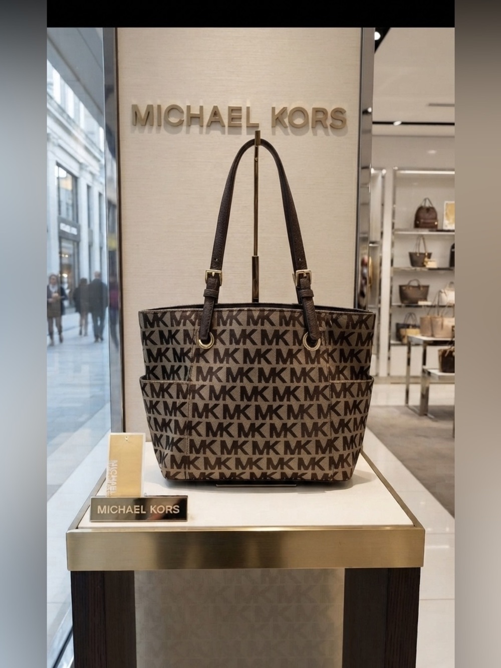 Michael Kors GUC Jet Set Logo
Tote.Coated canvas Beige & Brown MK
Leather straps